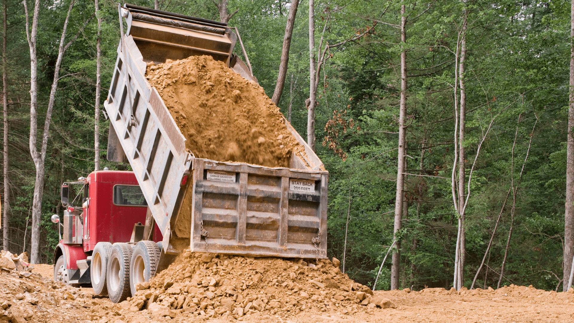 Dump Truck Unloading Fill in Texas