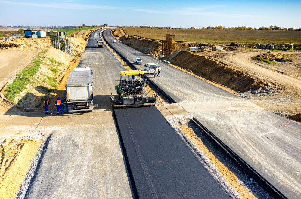 Aerial view of new highway asphalt construction